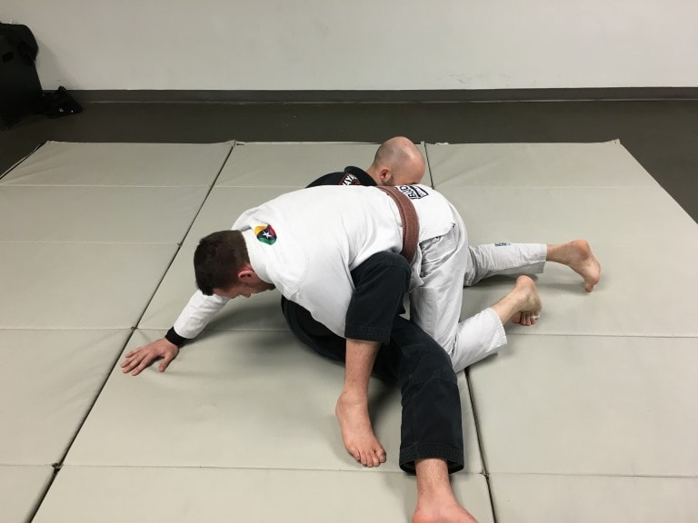 Completing the Omoplata escape in BJJ