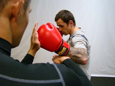 Have your elbow up for your left hook in Boxing