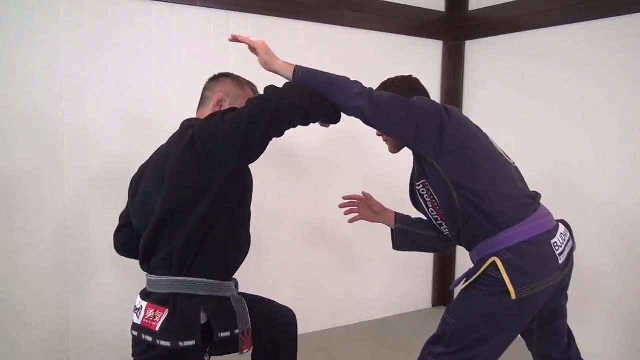 how to set up the arm drag to ankle pick combination in BJJ