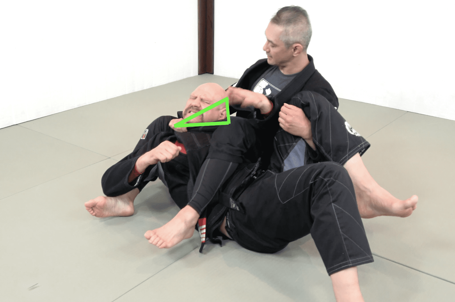 Learn the Lapel Chokes BJJ tutorial from InFighting Burnaby Infighting