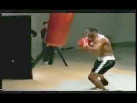 mike tyson on a heavy bag