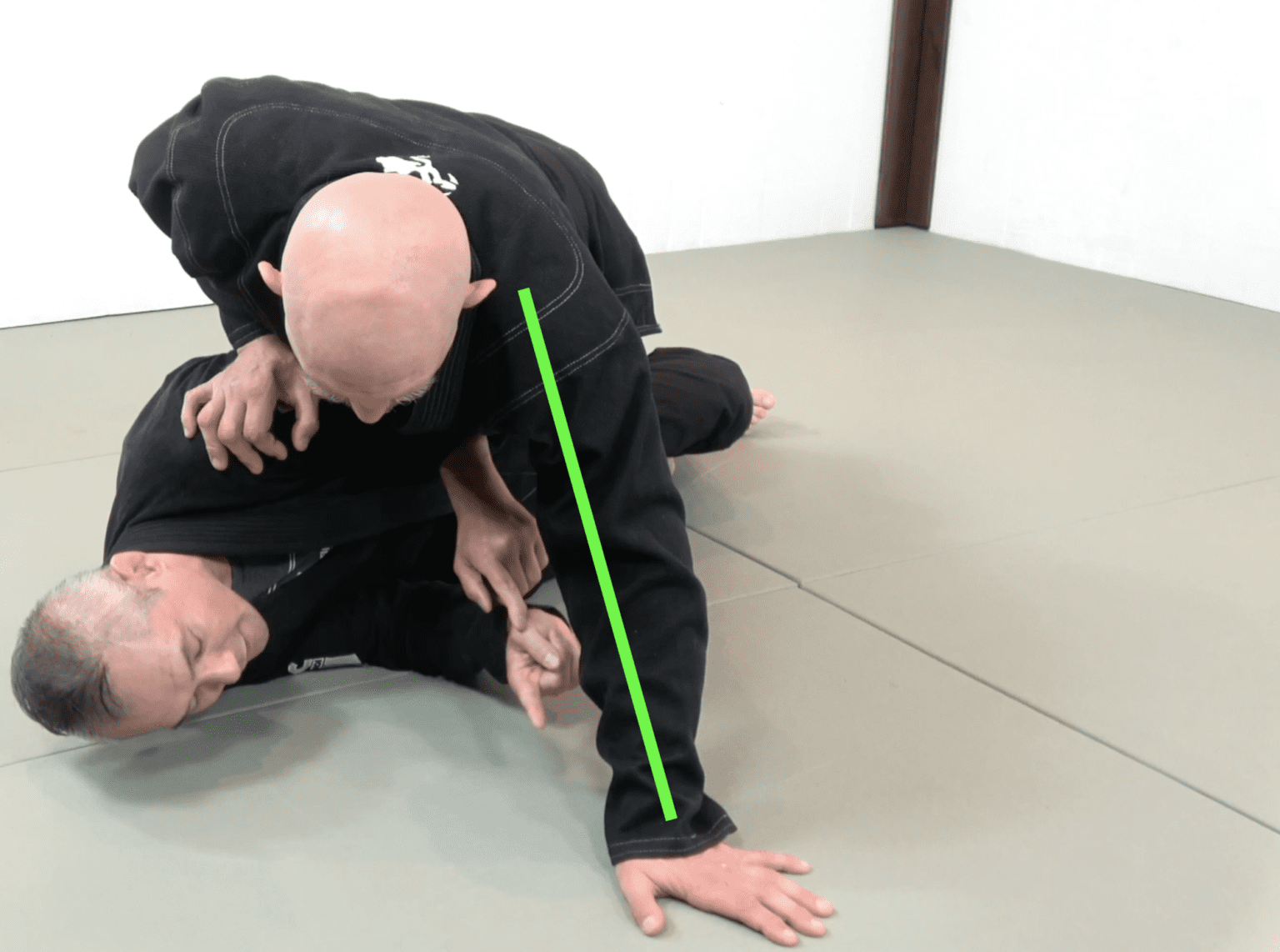 Learn the Bottom Mount Escape BJJ tutorial from InFighting Burnaby