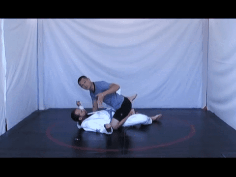 common-bjj-mistake-30-guard-passing-over-legs-trailing-leg